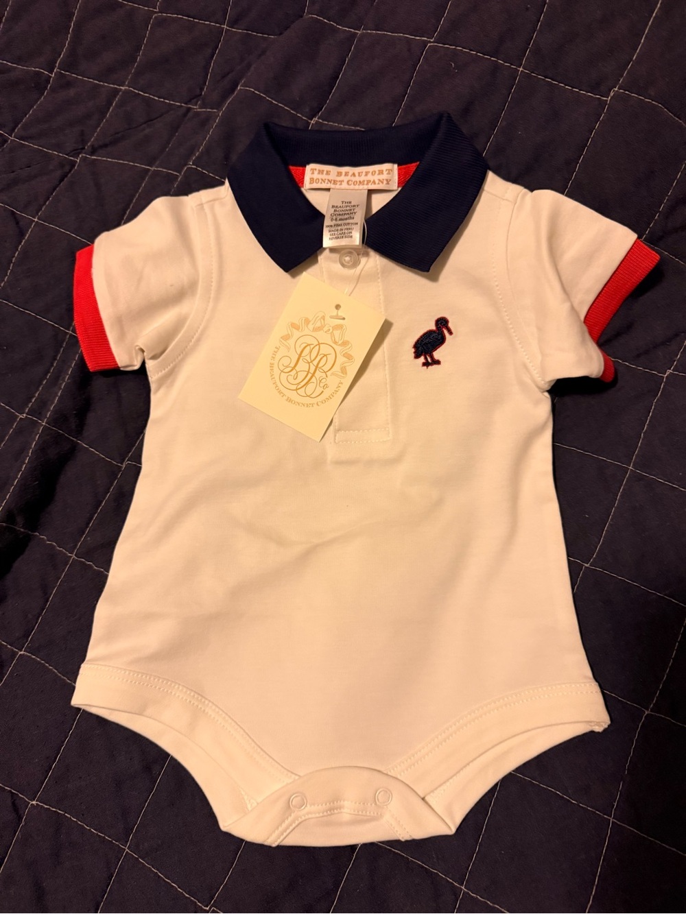 The Beaufort Bonnet Company White Onesie with Navy Collar and Red Trim